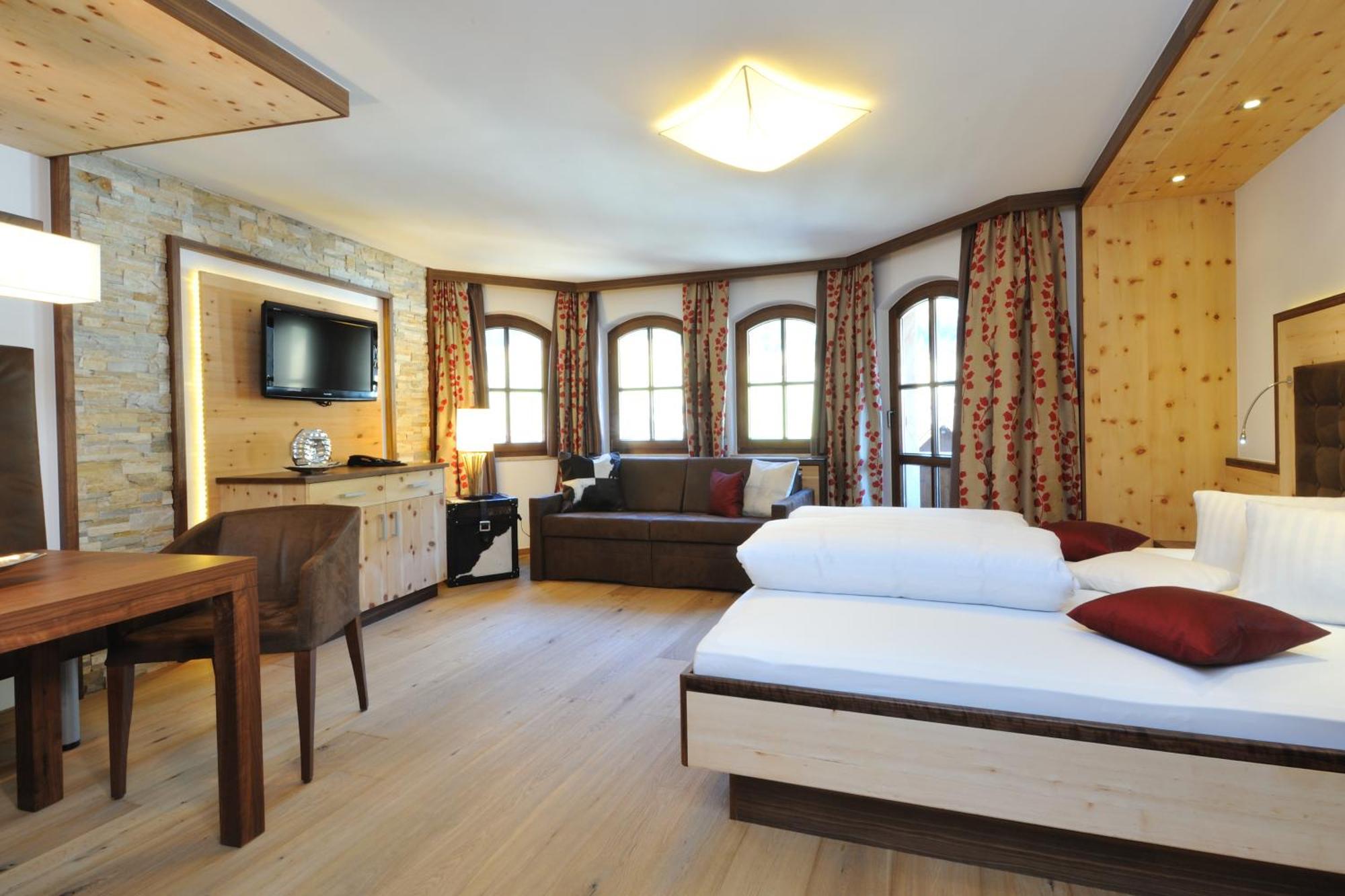 Alpinlounge Raetia Appartements อิสชเกิล ห้อง รูปภาพ